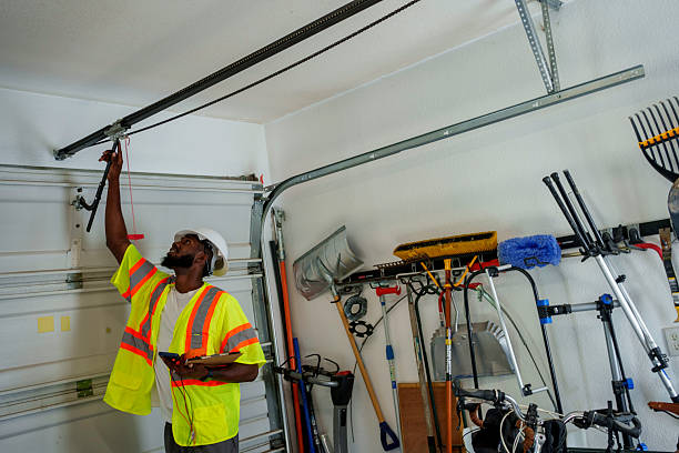Professional Garage Door Panel Replacement technician working in Hudson, IA
